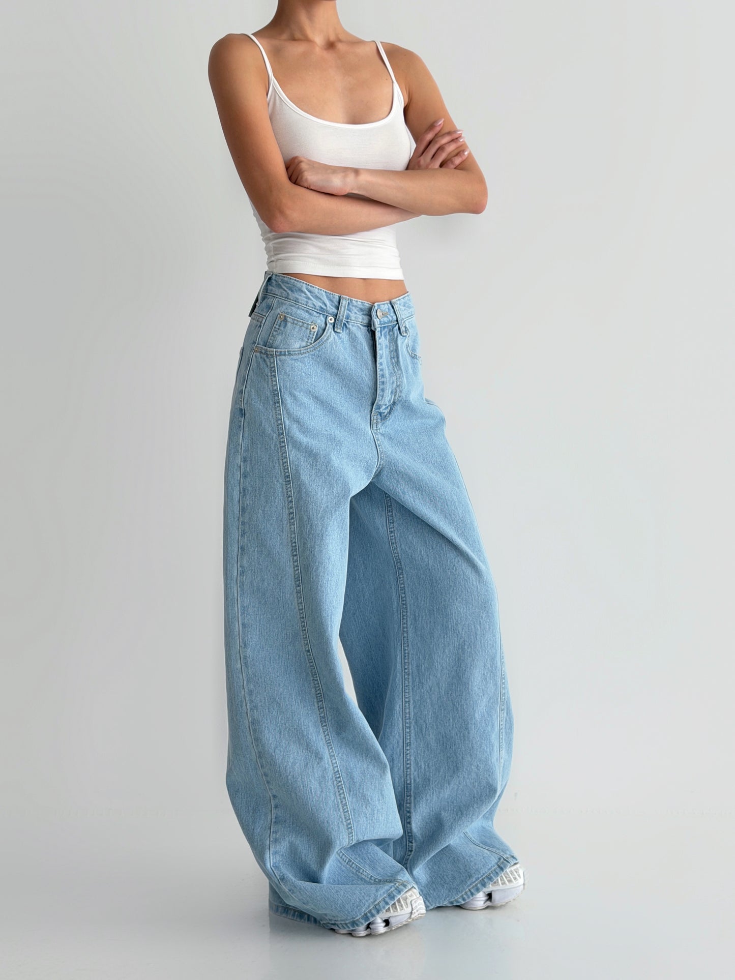Curved Cut Wide Bootcut Denim Pants