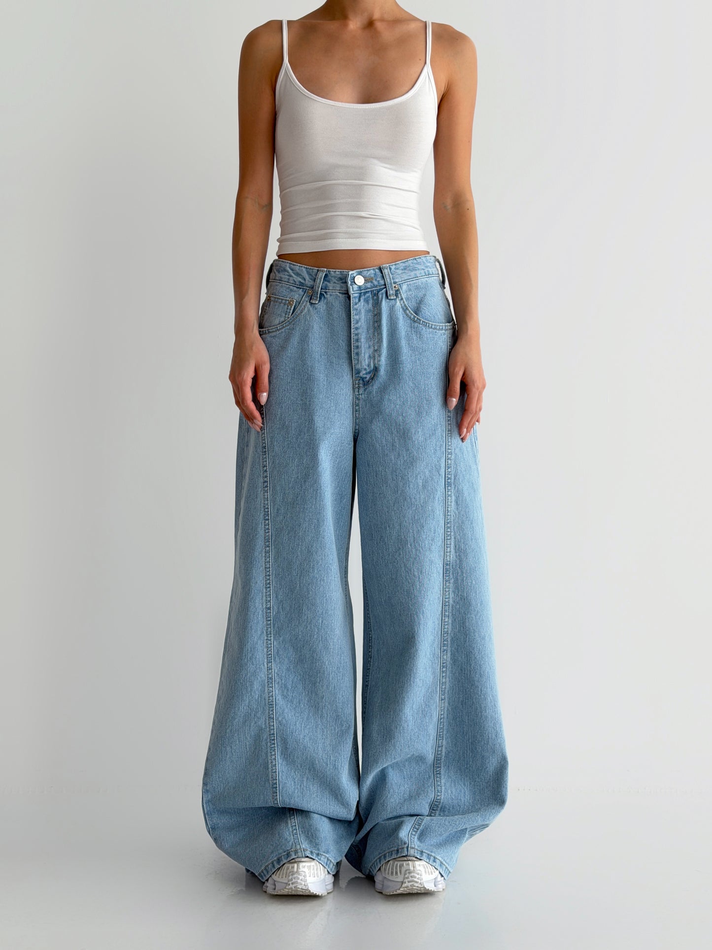Curved Cut Wide Bootcut Denim Pants