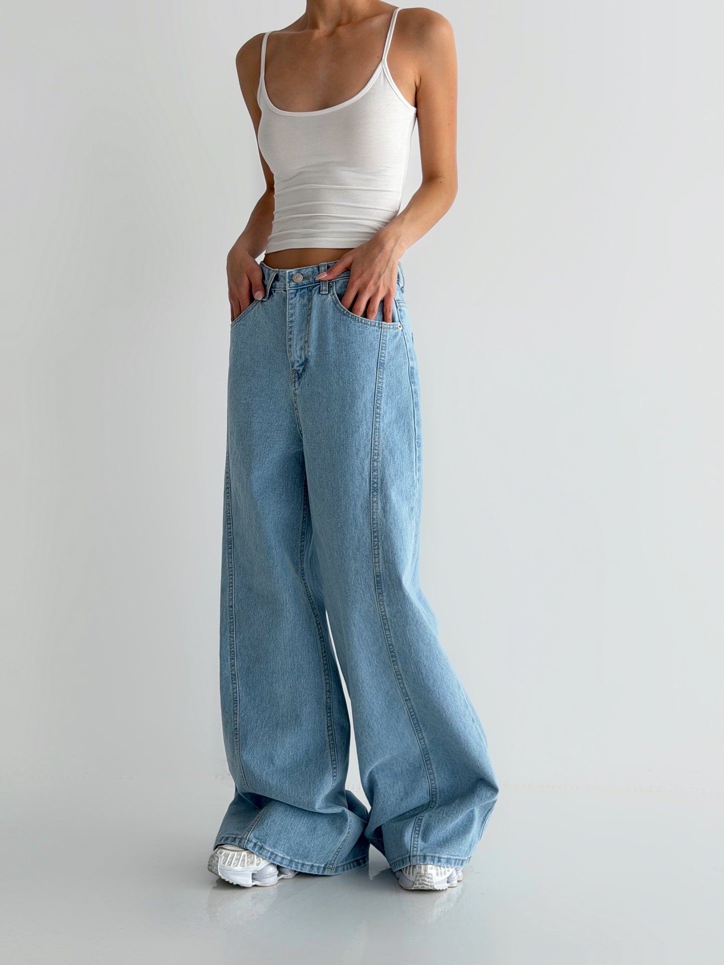 Curved Cut Wide Bootcut Denim Pants