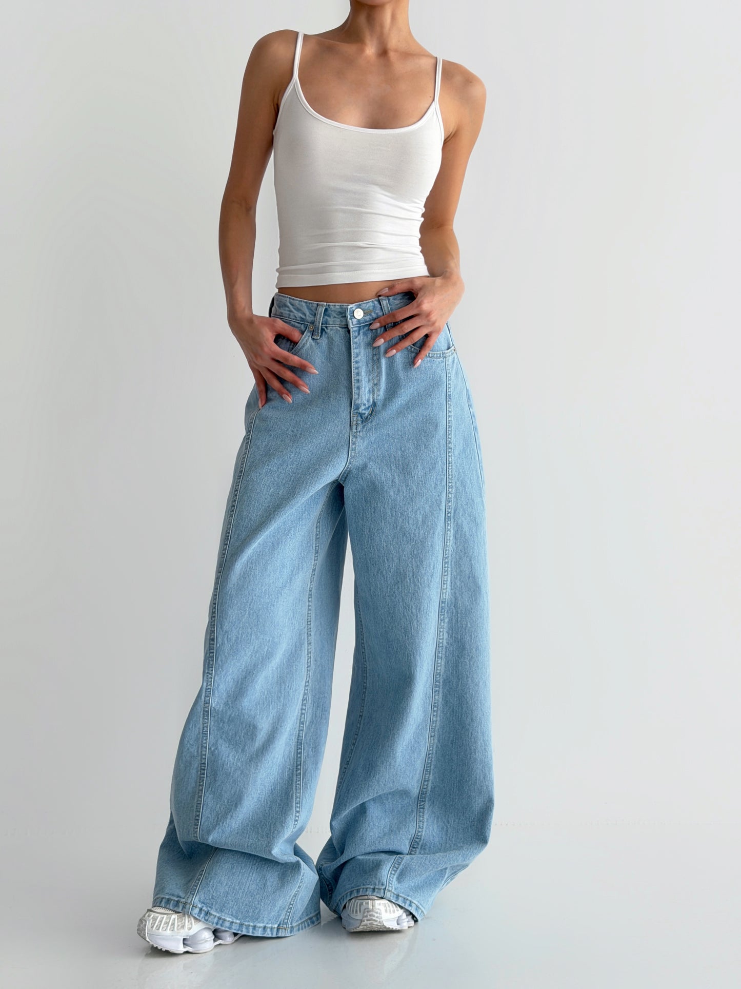 Curved Cut Wide Bootcut Denim Pants
