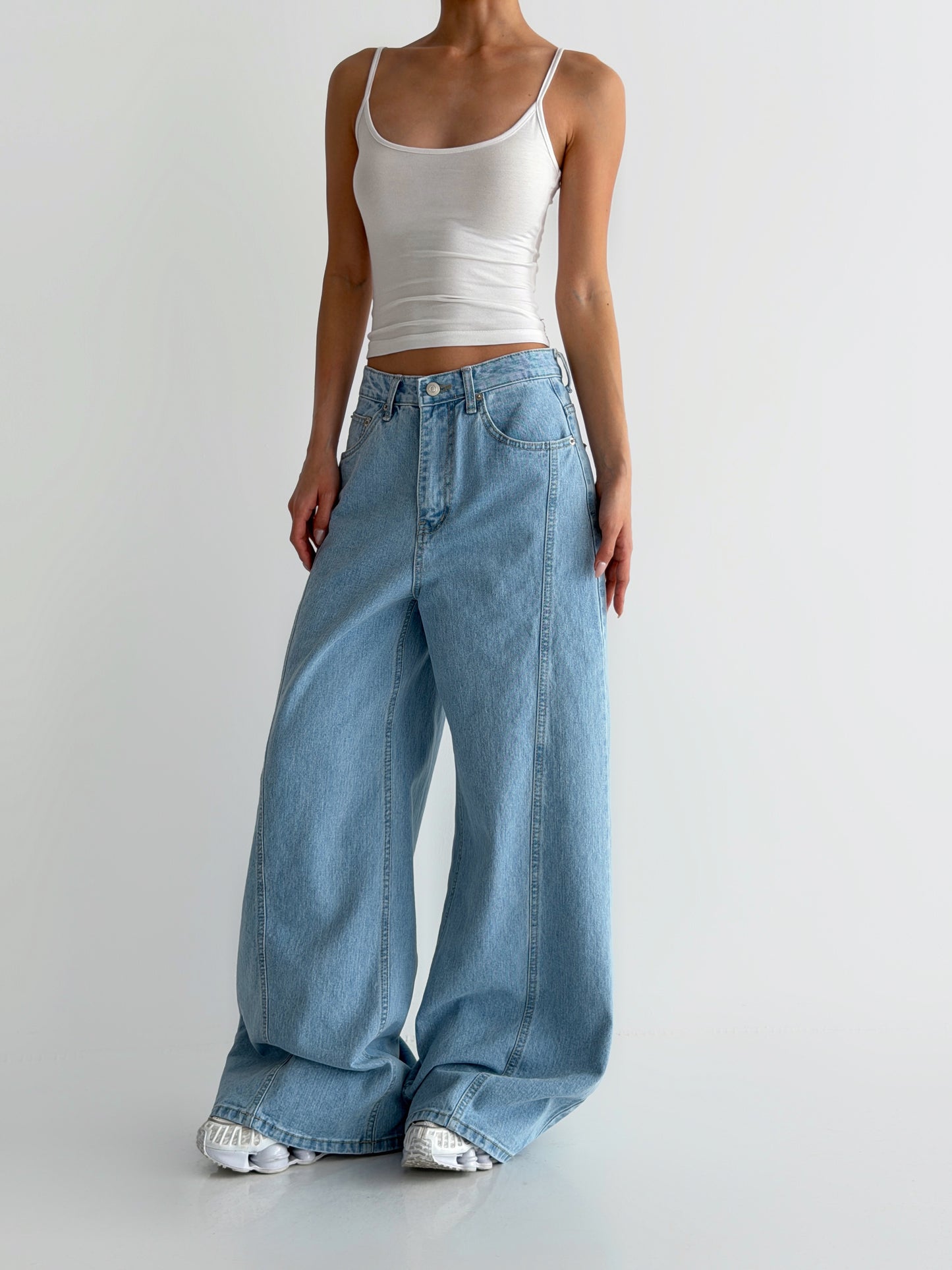 Curved Cut Wide Bootcut Denim Pants