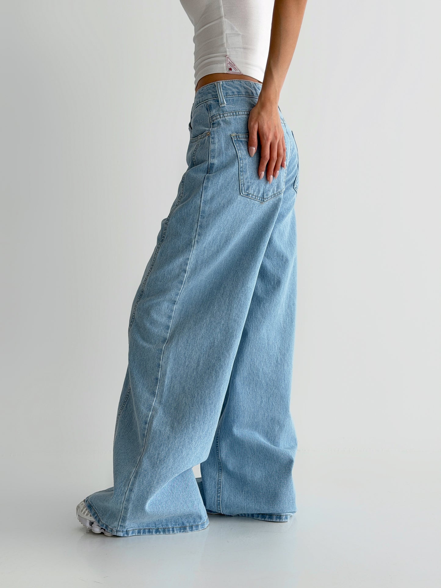Curved Cut Wide Bootcut Denim Pants